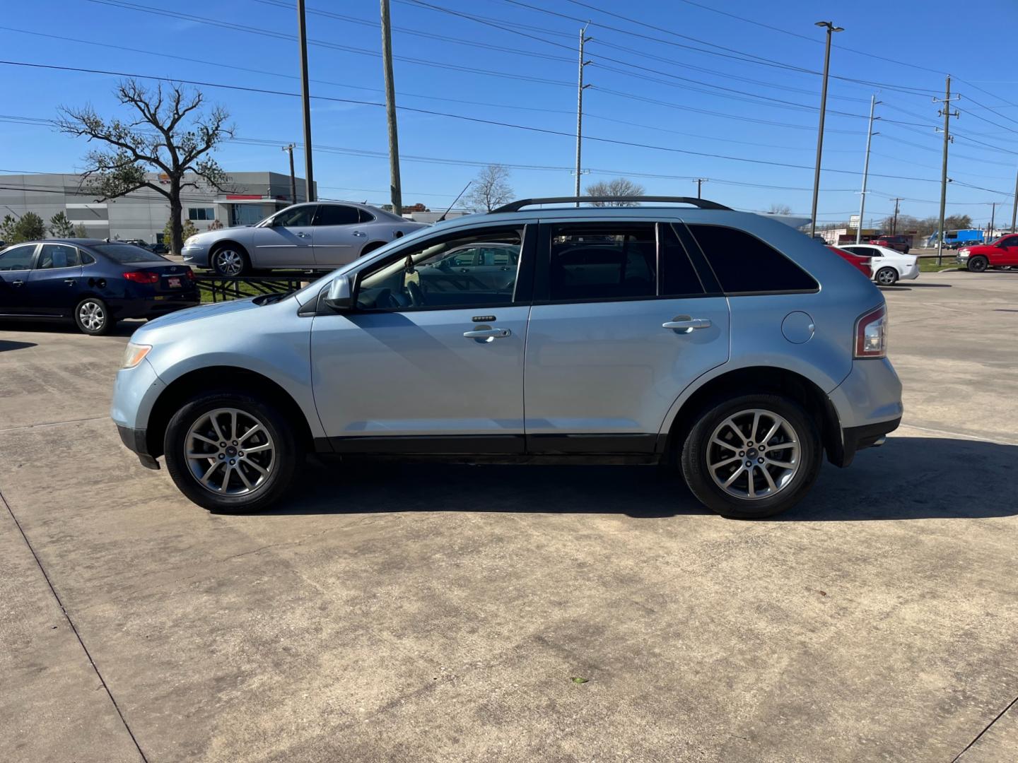 2008 blue /black Ford Edge SEL FWD (2FMDK38C98B) with an 3.5L V6 DOHC 24V engine, 6-Speed Automatic Overdrive transmission, located at 14700 Tomball Parkway 249, Houston, TX, 77086, (281) 444-2200, 29.928619, -95.504074 - Photo#3